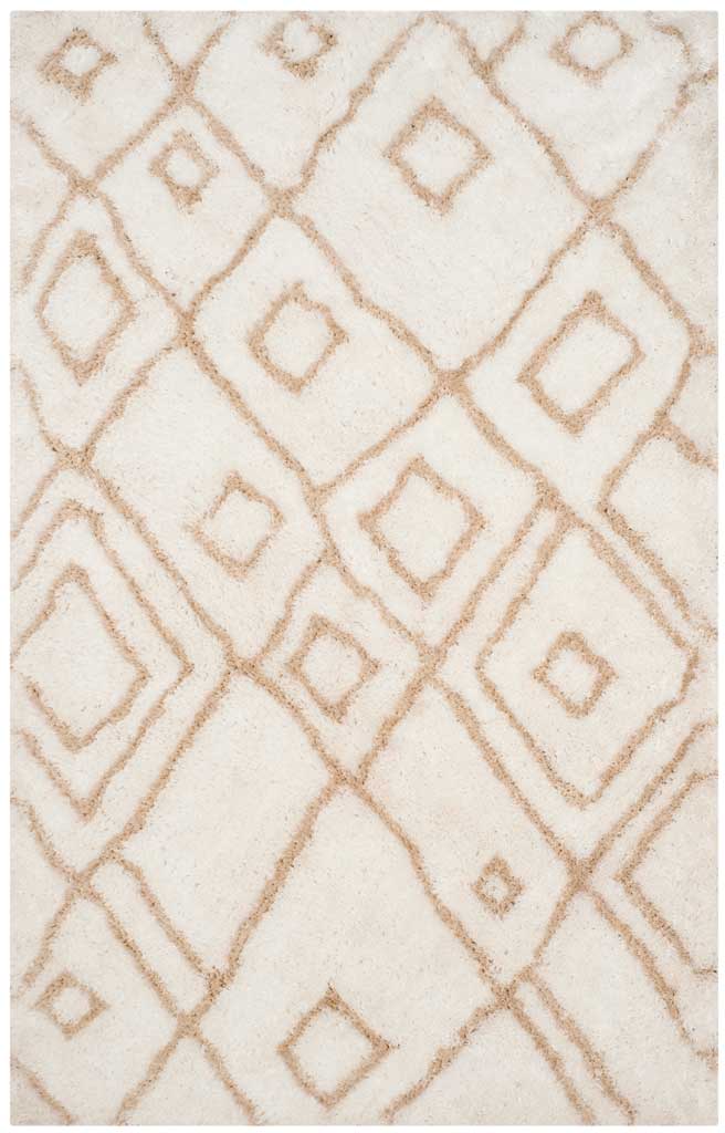 Soft ivory pile and warm beige diamonds lend this rectangular rug subtle geometric depth