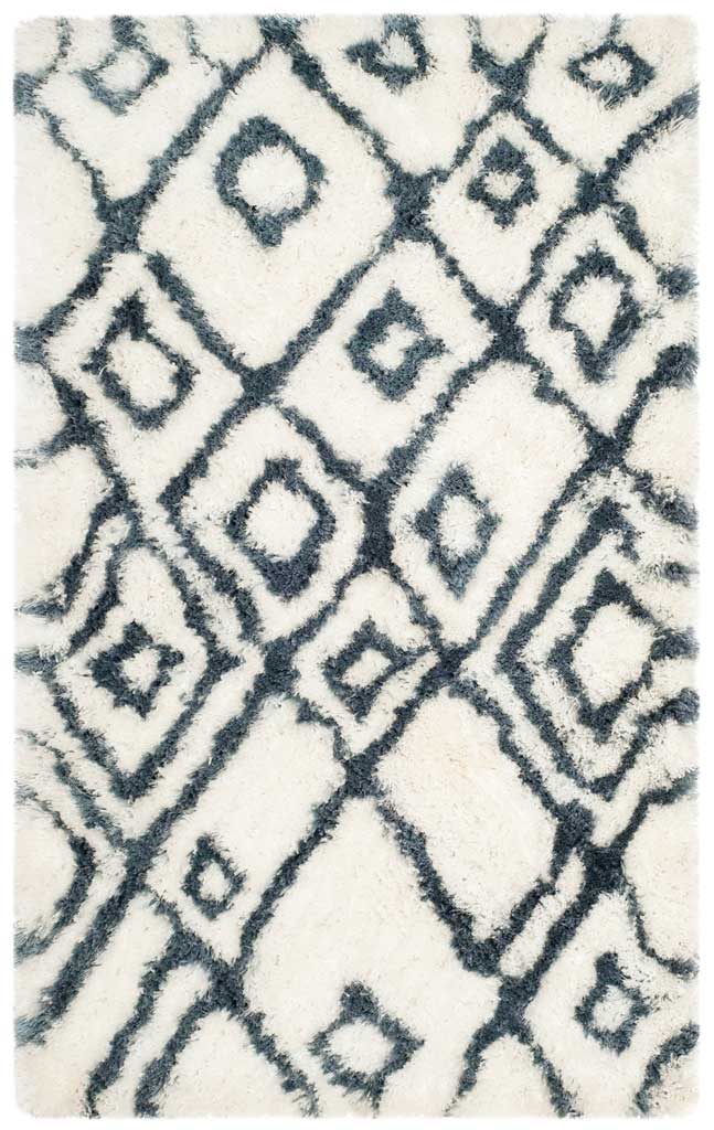 Bold blue diamonds cross the fluffy ivory surface of this cozy rectangular rug