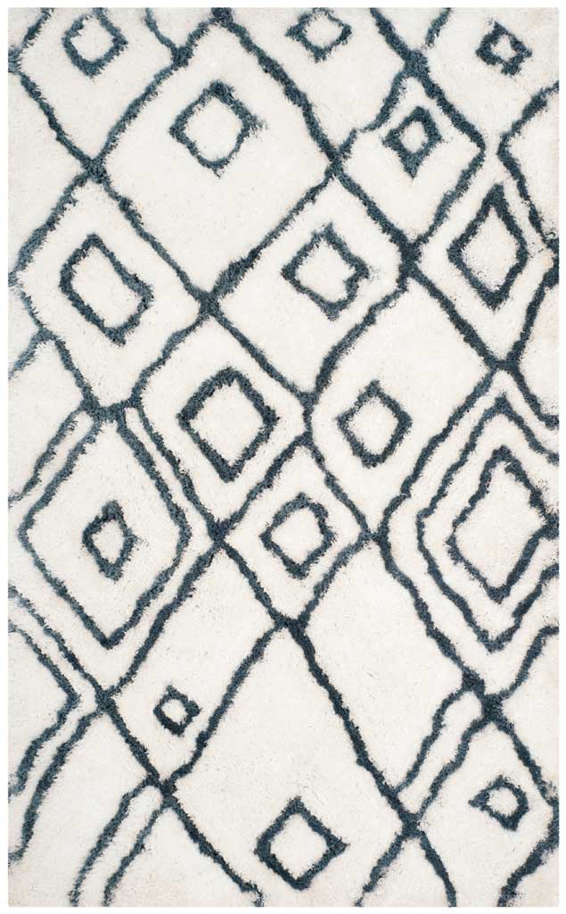 A thick ivory shag rug features blue geometric diamonds and layered linework
