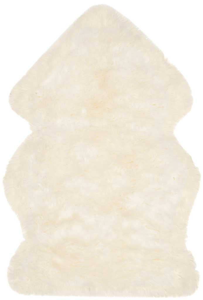 A single undyed sheepskin hide features fluffy ivory fleece and a softly tapered end.
