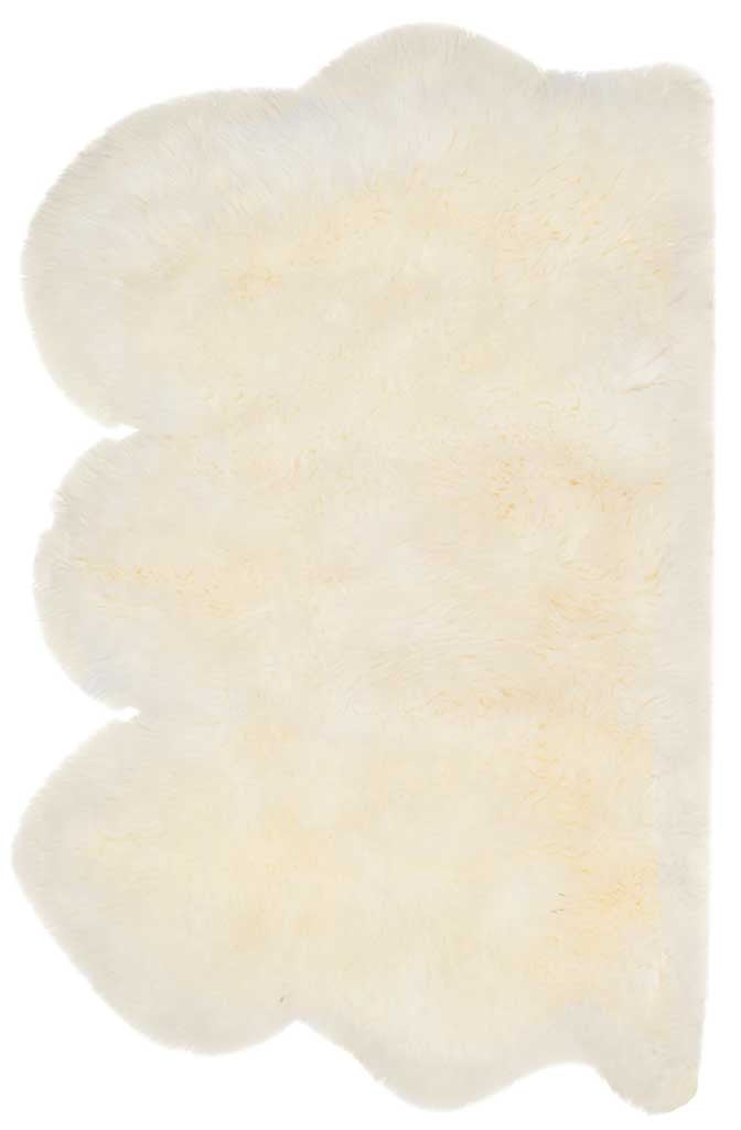 Soft ivory fleece and three rounded lobes give this sheepskin rug a distinctive shape.