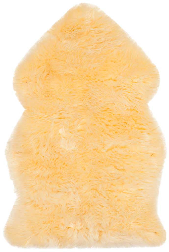 A single champagne sheepskin brings cozy texture with its fluffy, natural contours.