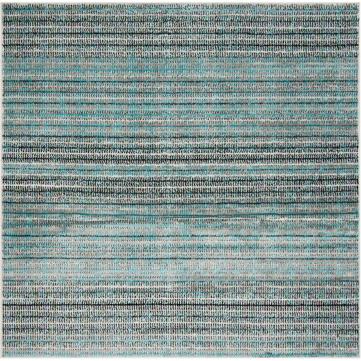 A square rug pairs layered blue and gray stripes with softly shifting light and dark tones.