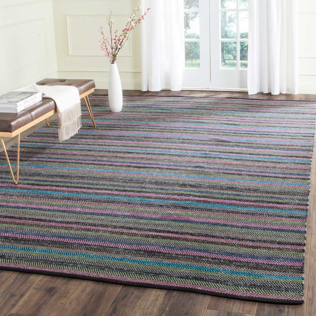 Multicolored stripes add a lively, low-profile accent to a light-filled living space