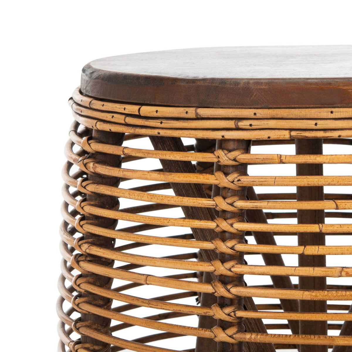 Dark wood grain contrasts with the warm honey-brown rattan weave
