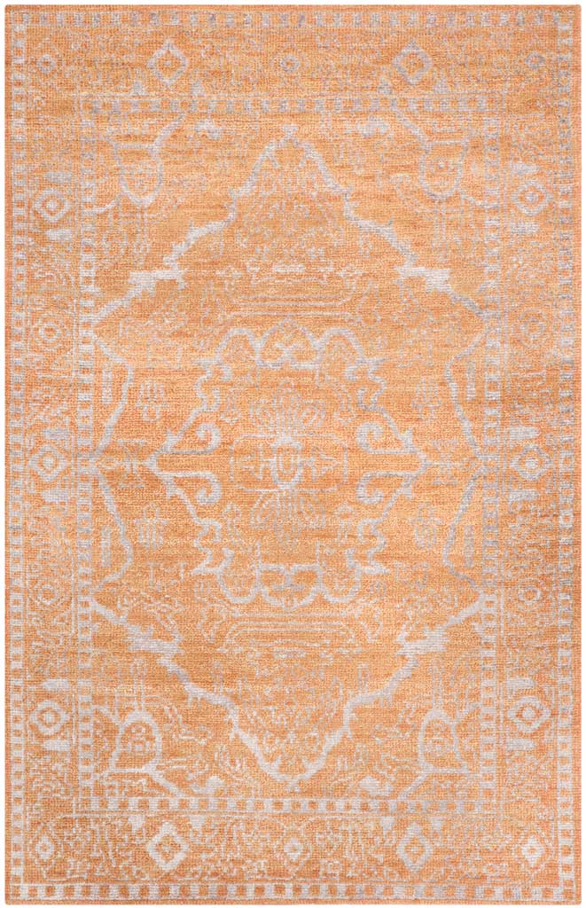 Warm apricot rug with a softly distressed silver medallion and delicate border