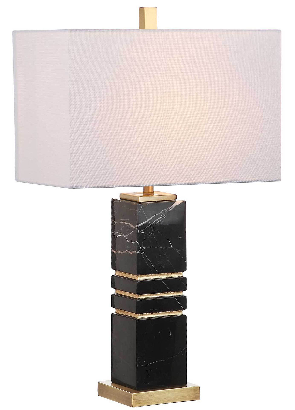 A softly glowing white shade complements the black marble column and brass-gold trim