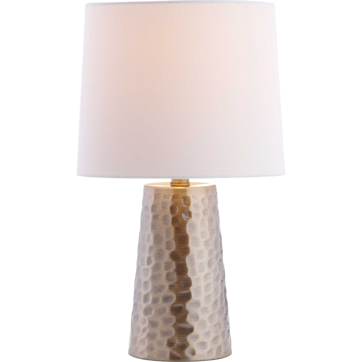 A warm glow lights the white shade above a textured gold-tone metal base.