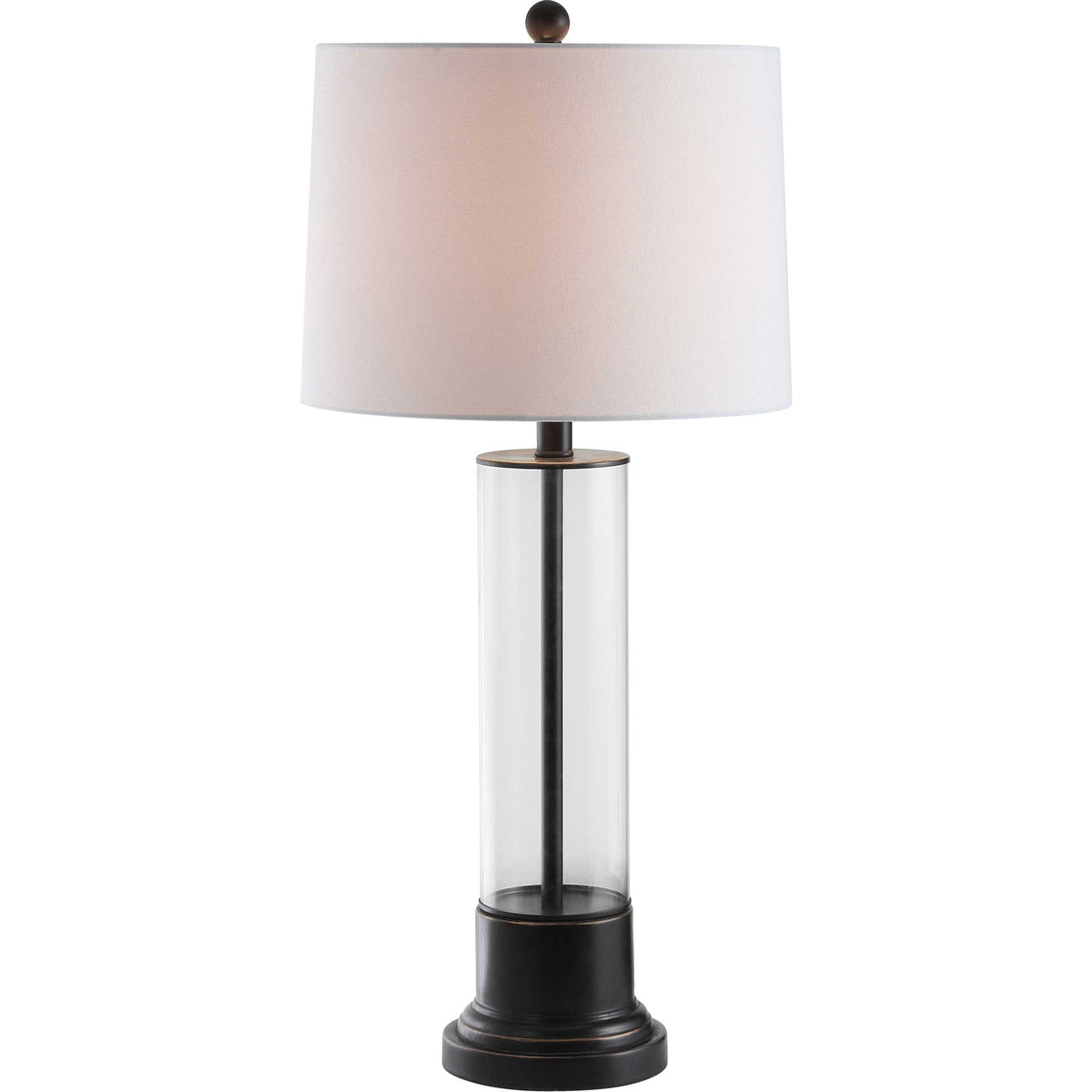 A warm glow lights the white shade above a clear glass column and black pedestal base.
