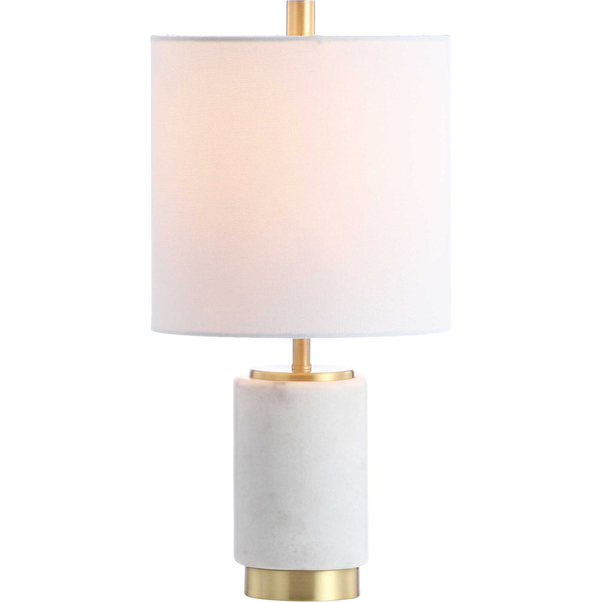 A warm glow shines through the white shade above a marble base with brass accents