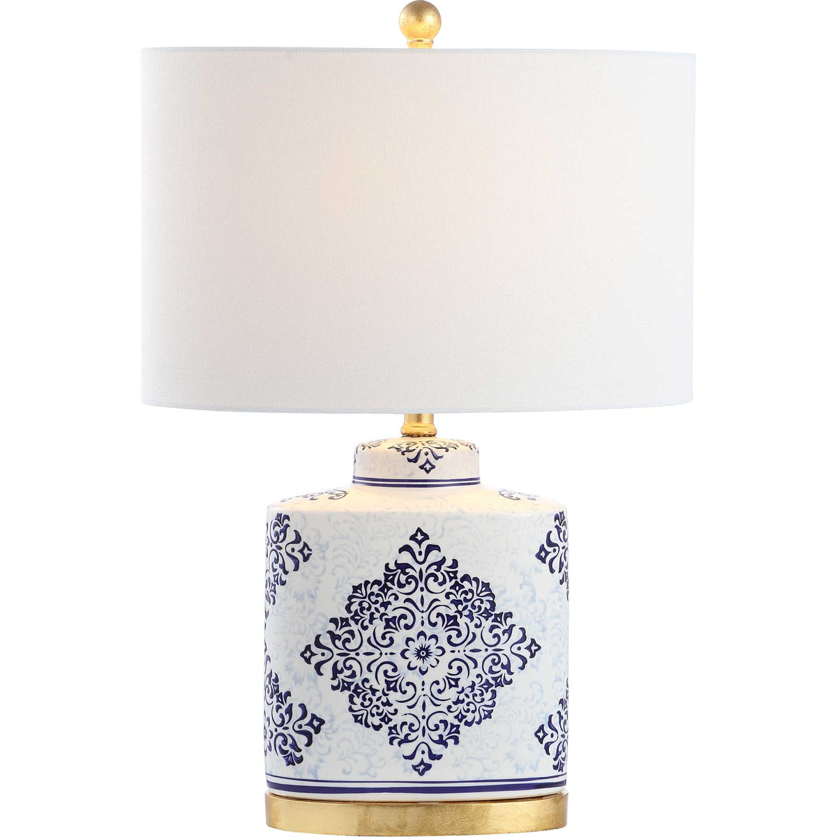A softly glowing white drum shade tops blue-and-white floral ceramic with gold trim.