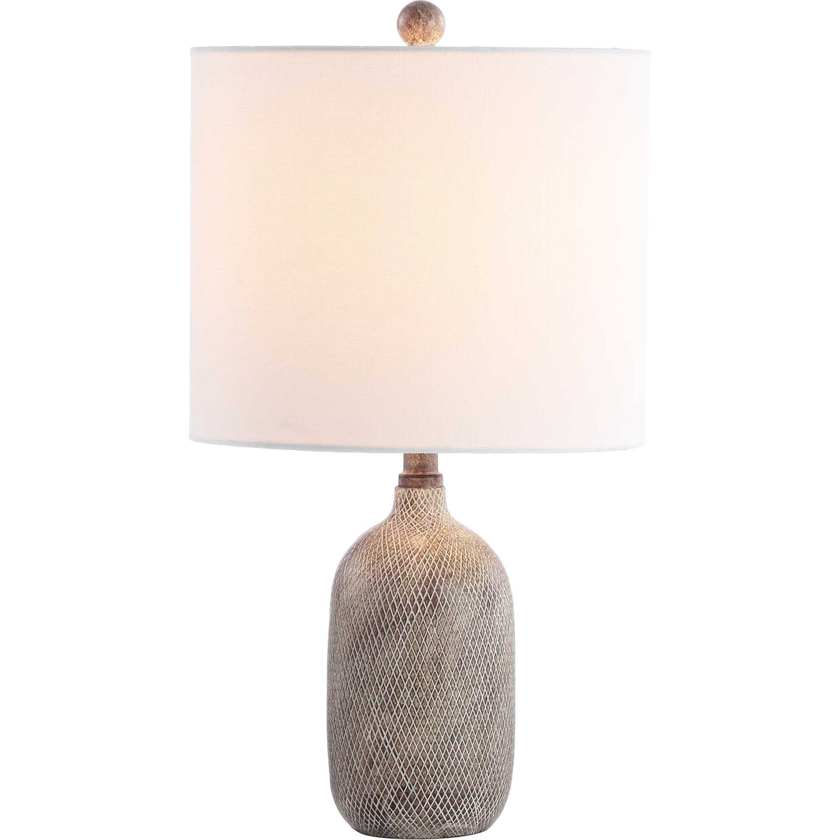 A warm glow shines through the white shade above a patterned gray base.