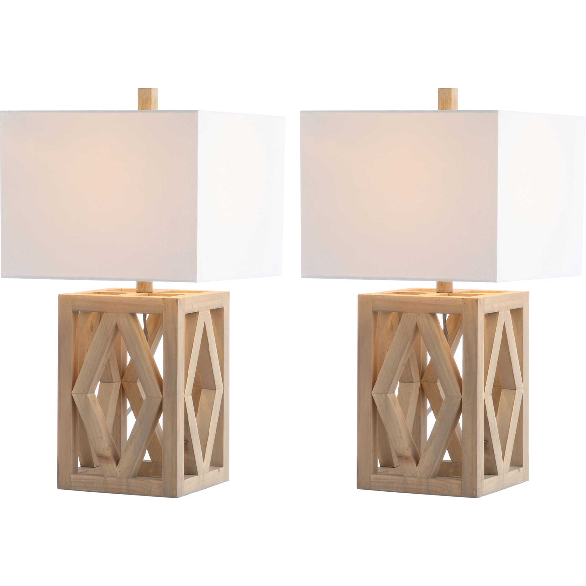 A pair of wood table lamps casts a soft glow through clean-lined white fabric shades