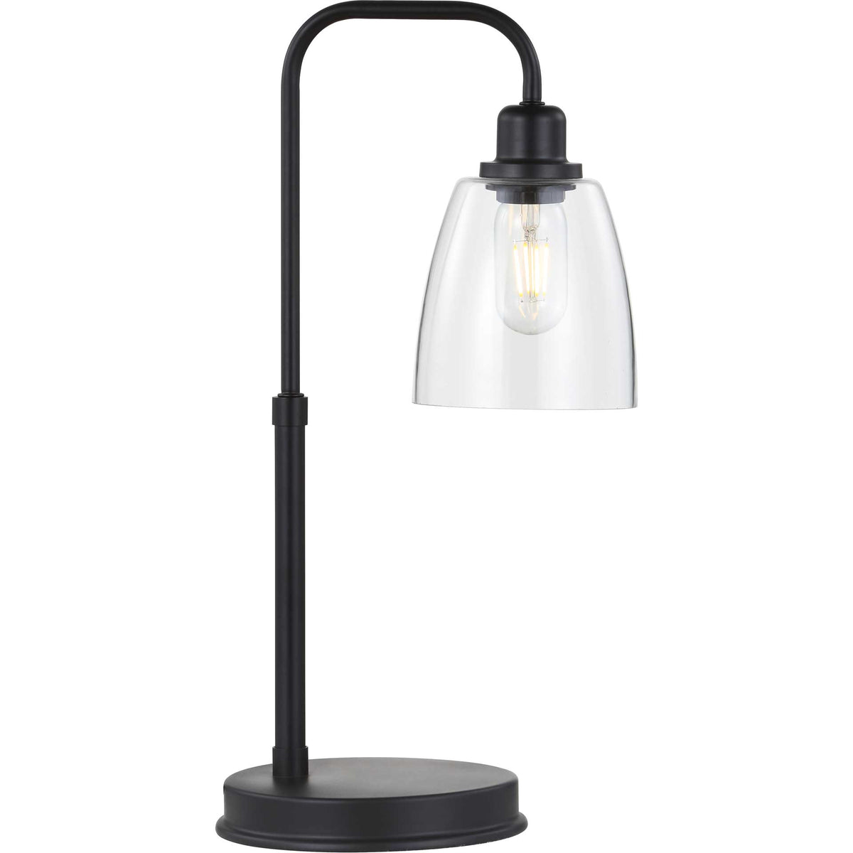 An exposed bulb glows beneath the clear glass shade of a slender black task lamp.