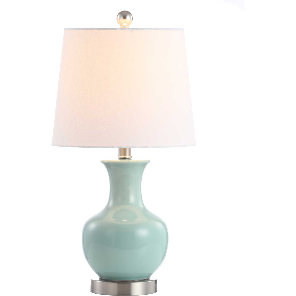 Blue ceramic table lamp with a softly glowing white shade and gleaming metal accents