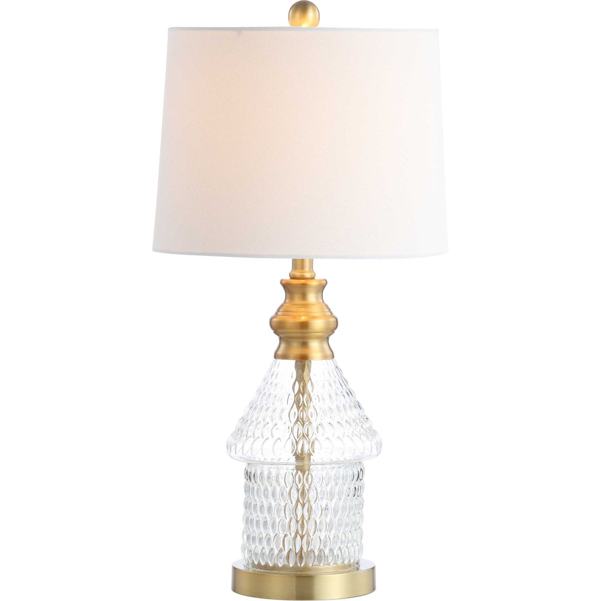 A glowing white shade brings warmth to the textured glass base and brass-toned details