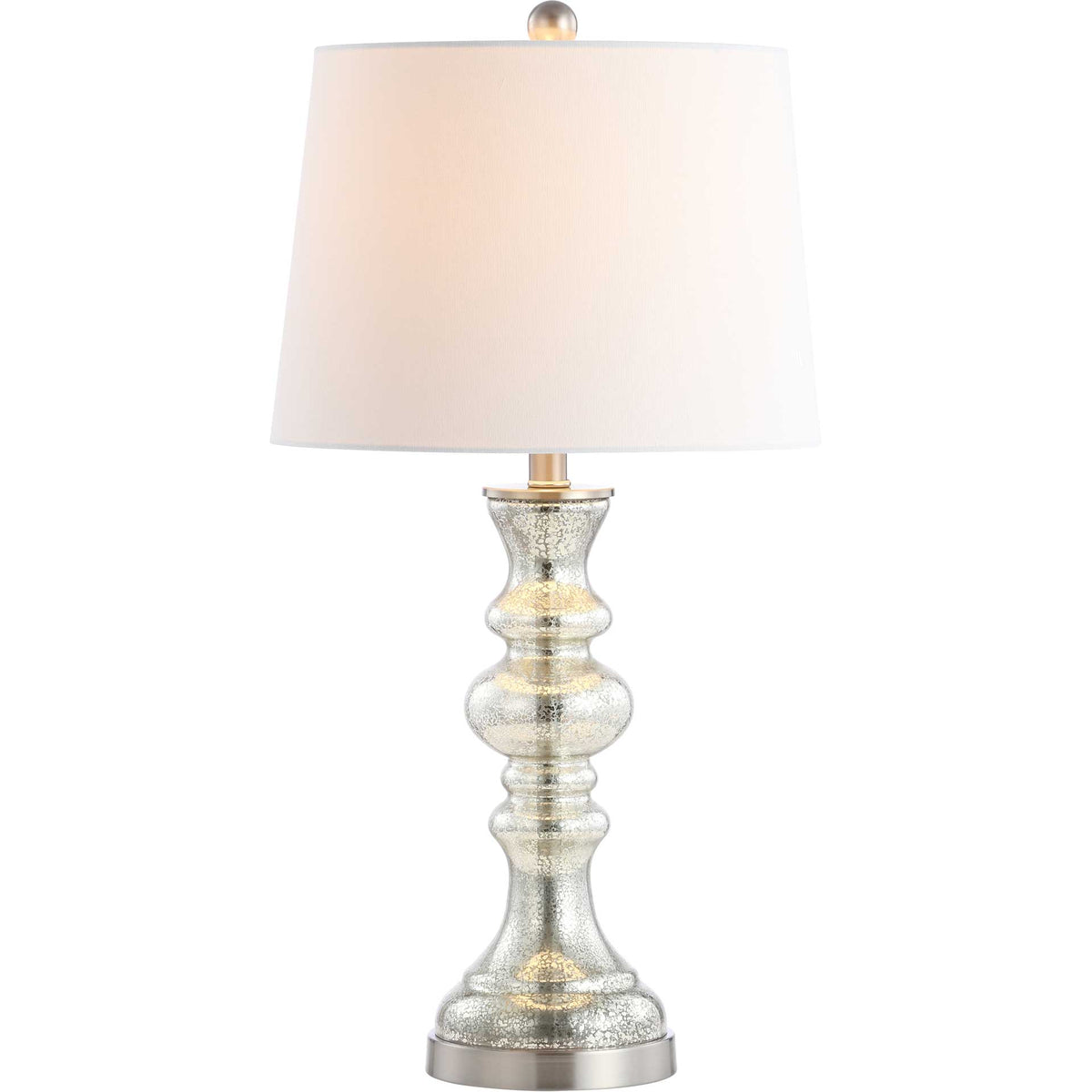 A softly glowing shade illuminates the lamp's graceful curves and shimmering silver finish.
