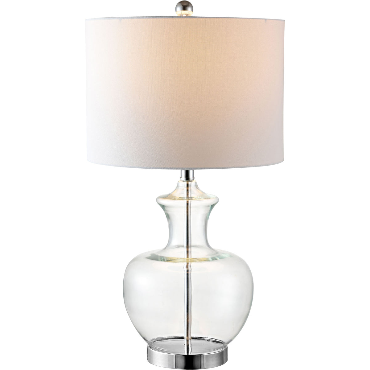 Warm light glows through a white drum shade above a clear glass vase base with chrome accents