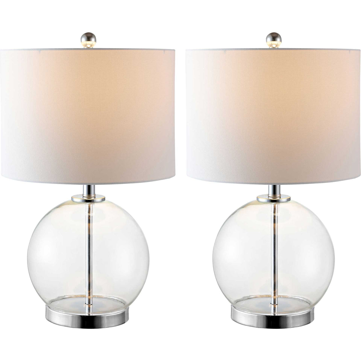 Warm light glows through the white drum shades of two clear glass globe lamps