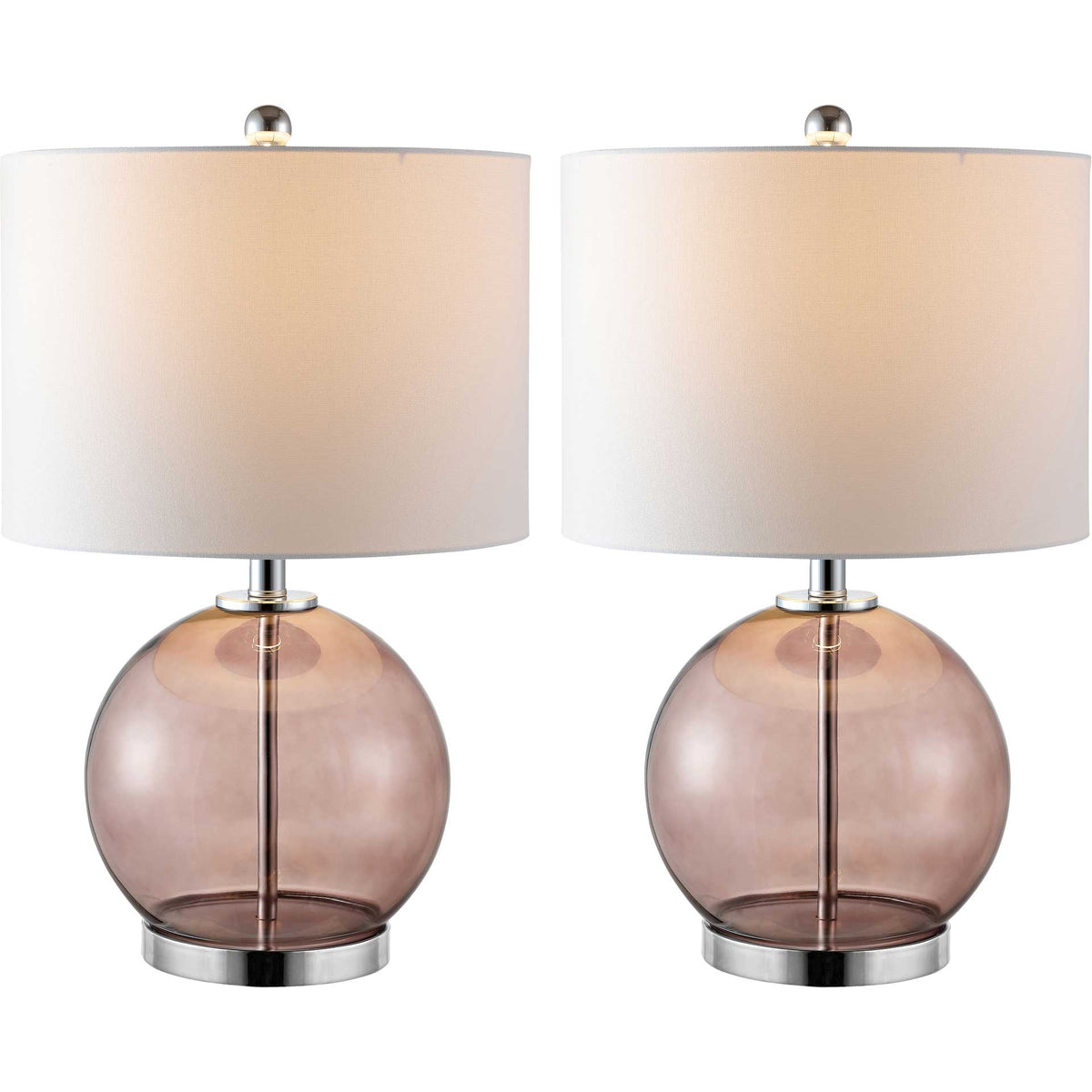 Two gray glass globe lamps shine warmly beneath white drum shades and chrome finials