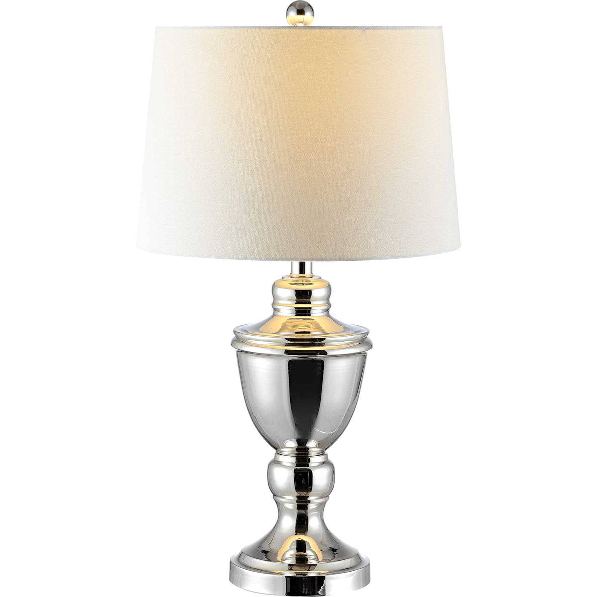 Warm light glows through a white shade above the sculpted nickel base