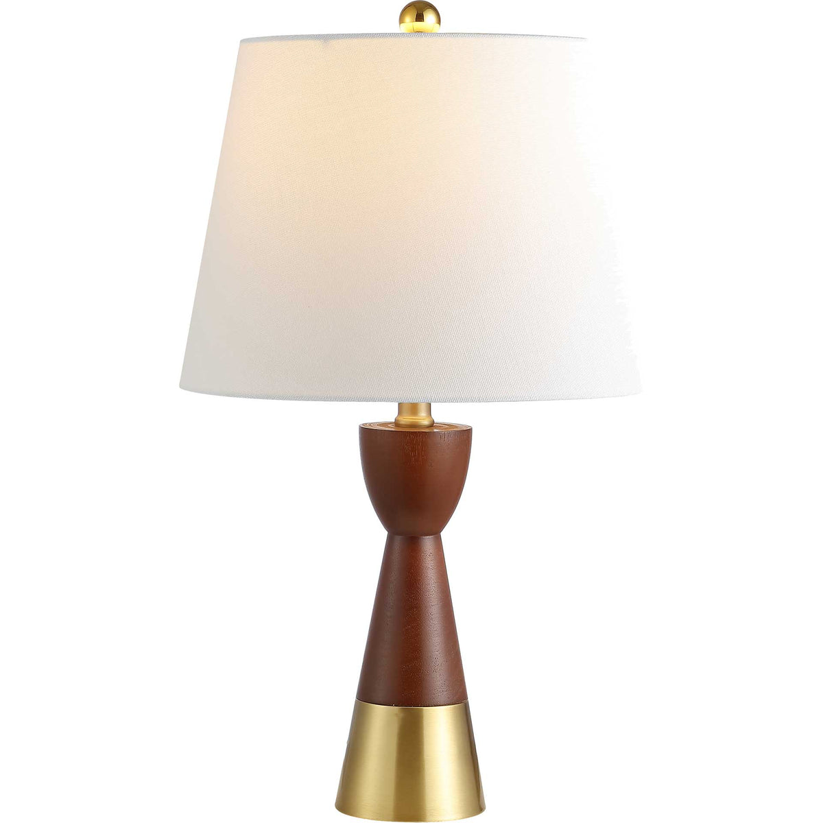 Warm light glows through a white shade above a tapered brown-and-gold base