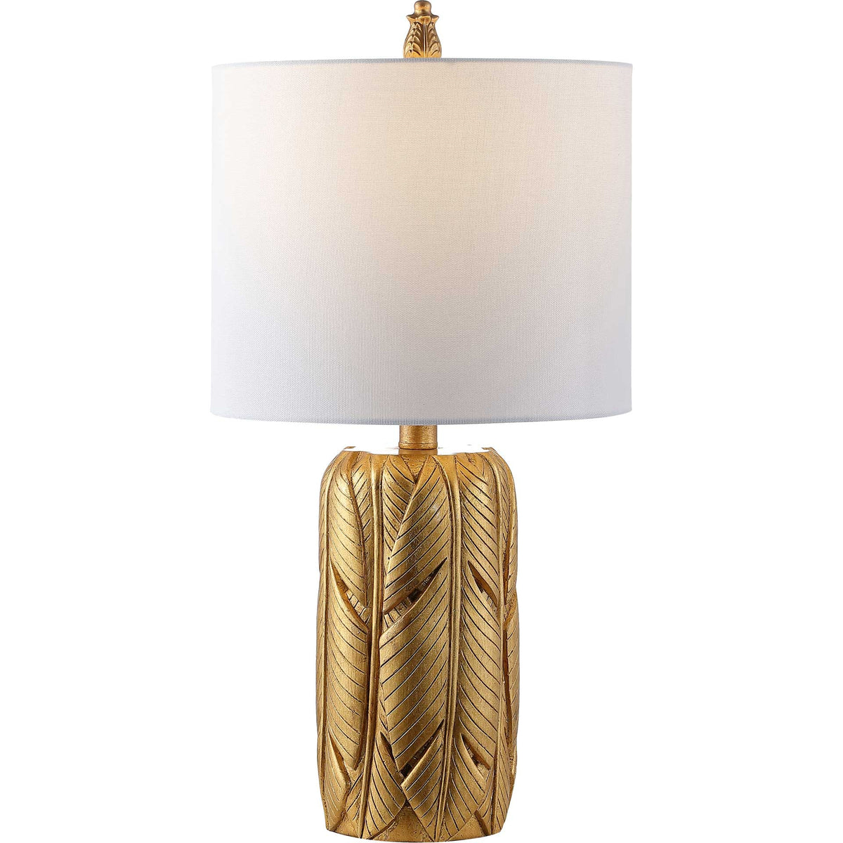 A glowing white drum shade tops a gold lamp with carved, featherlike leaf motifs