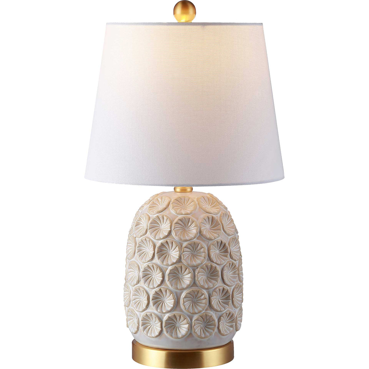 A soft glow shines through the white shade above a sculpted ceramic base with gold-tone accents