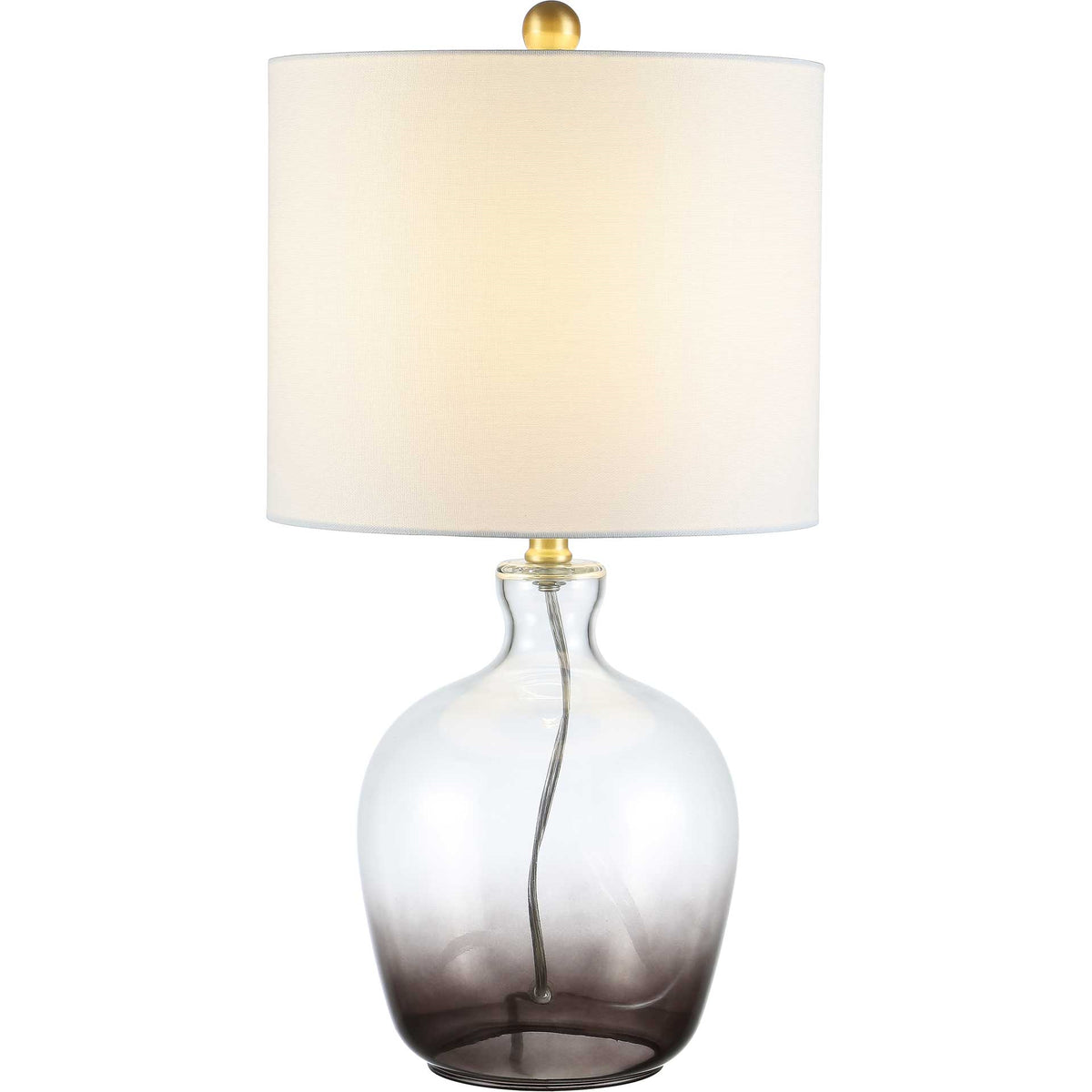A softly glowing white drum shade tops a rounded glass base with a smoky gray gradient