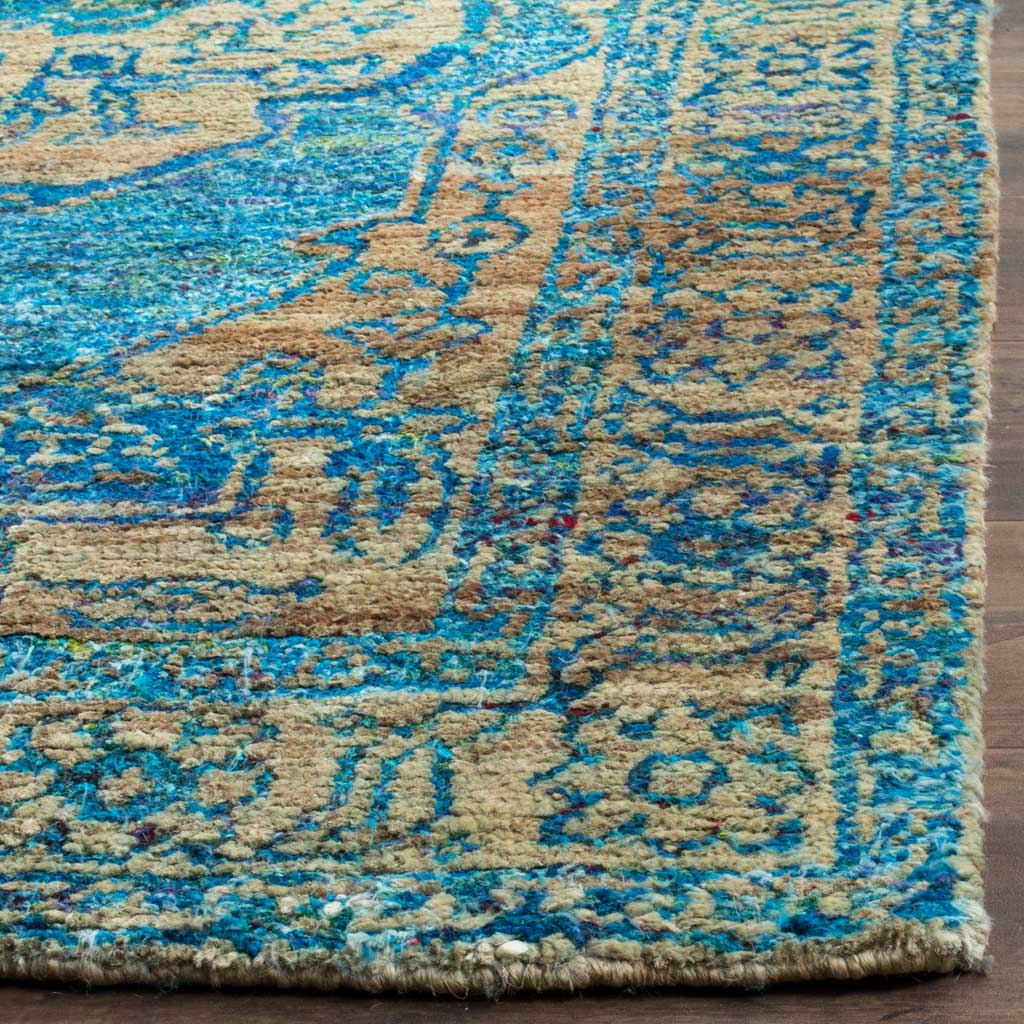An intricate teal and beige border highlights the rug's textured, finished corner