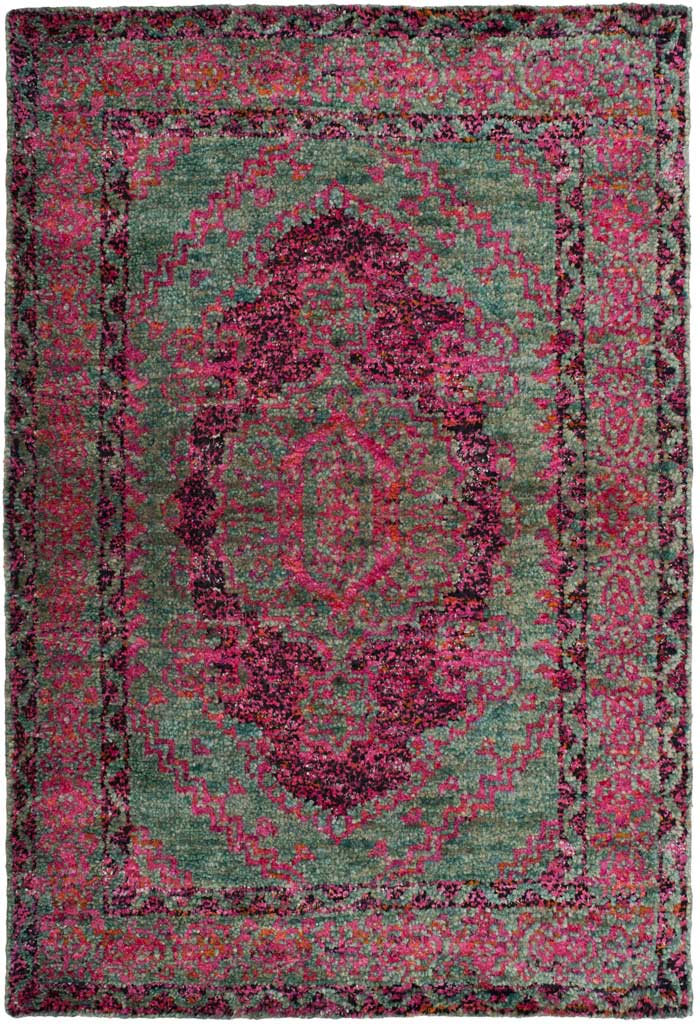 Fuchsia florals brighten a slate blue rug with a dramatic central medallion