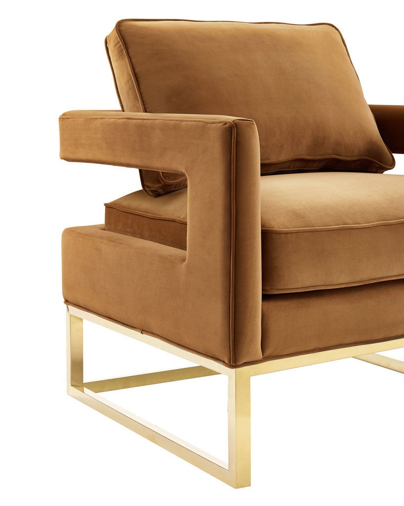 Clean-lined arms and precise piping highlight the soft texture of this cognac velvet chair.