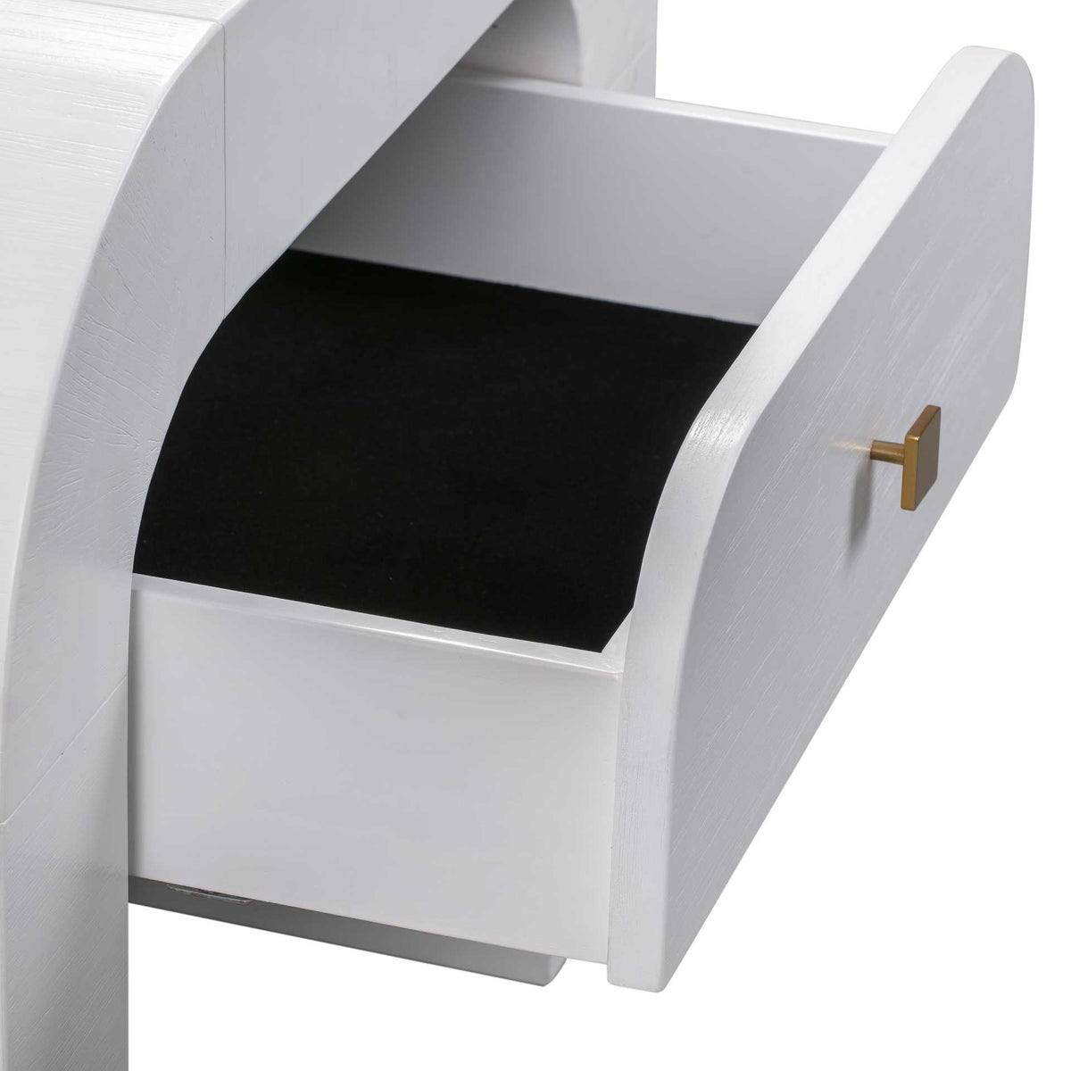 A black-lined drawer provides concealed storage, framed by white sides and a gold-tone square knob.