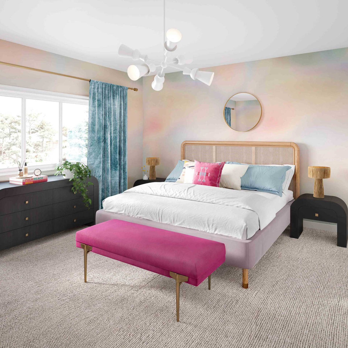 Black ribbed drawers and gold-tone knobs bring striking storage to a colorful, light-filled bedroom.