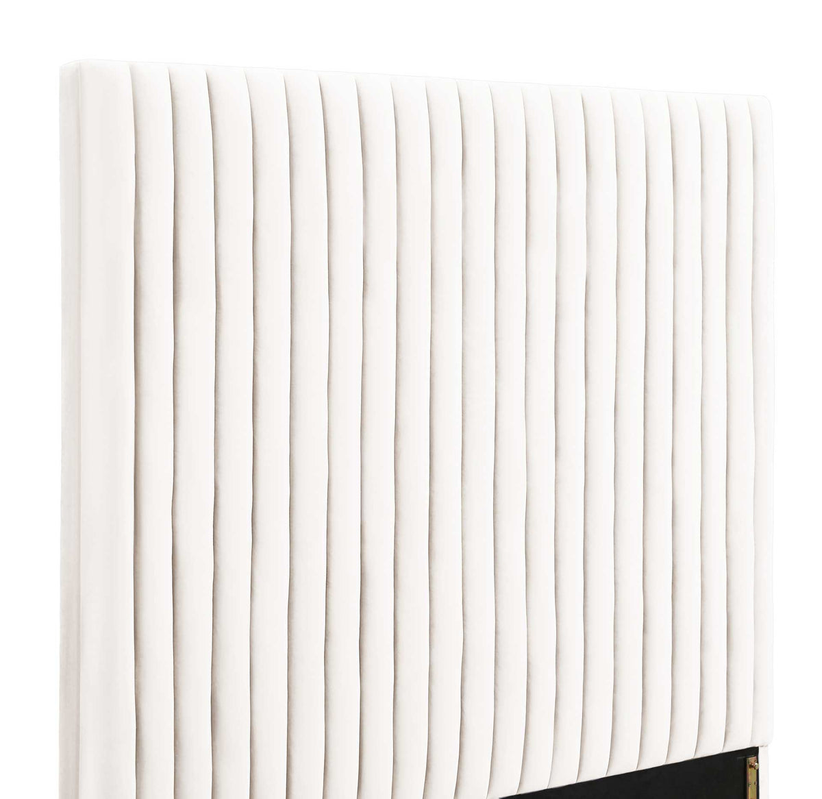 Thick vertical channels create a softly sculpted texture across the white velvet headboard