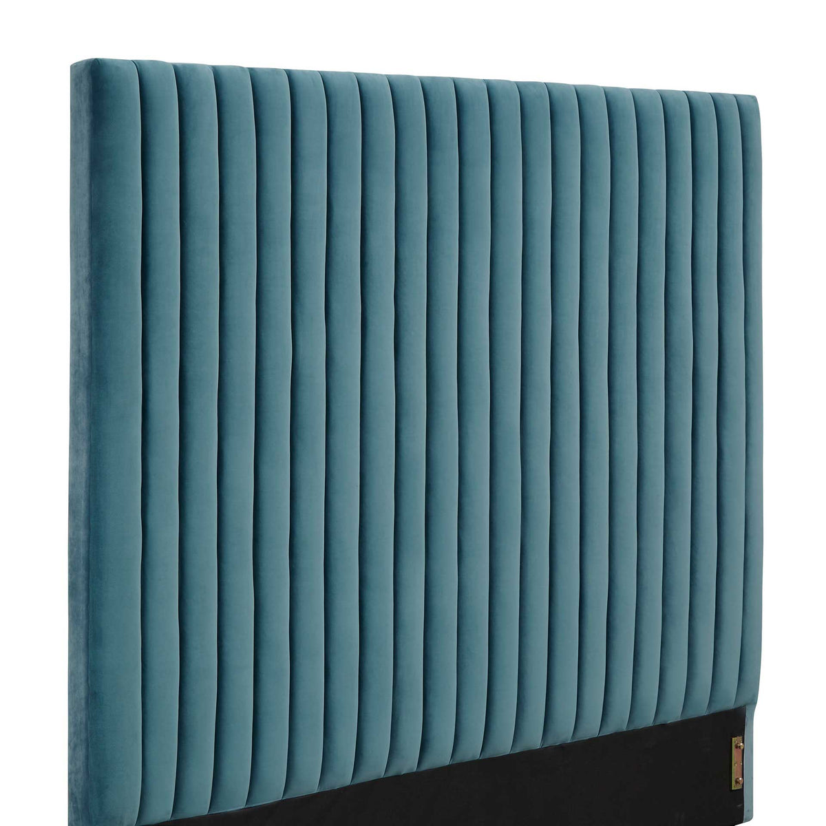 Plush sea blue velvet and deep vertical channels give the padded headboard a sculpted, luxurious feel