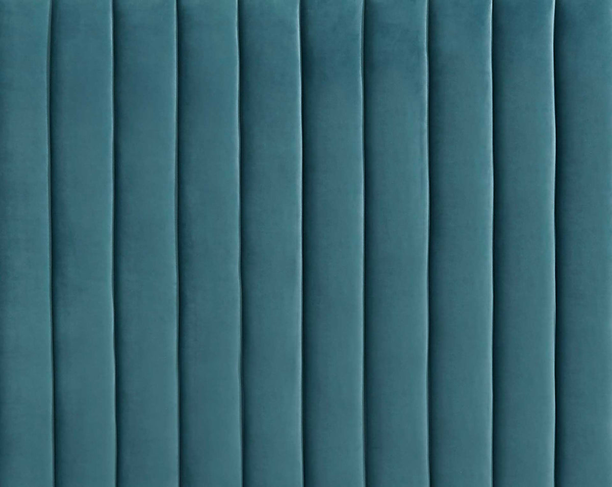 Soft blue velvet forms rounded, closely spaced channels for inviting texture and subtle sheen