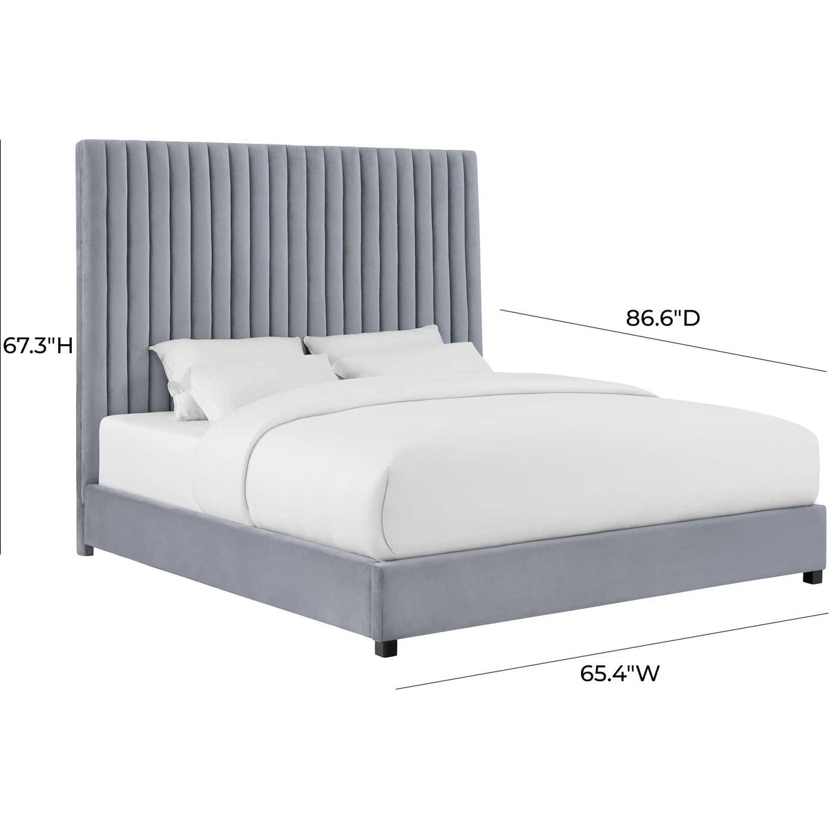 A tall, channel-tufted headboard and matching gray velvet rails create an elegant bedroom centerpiece