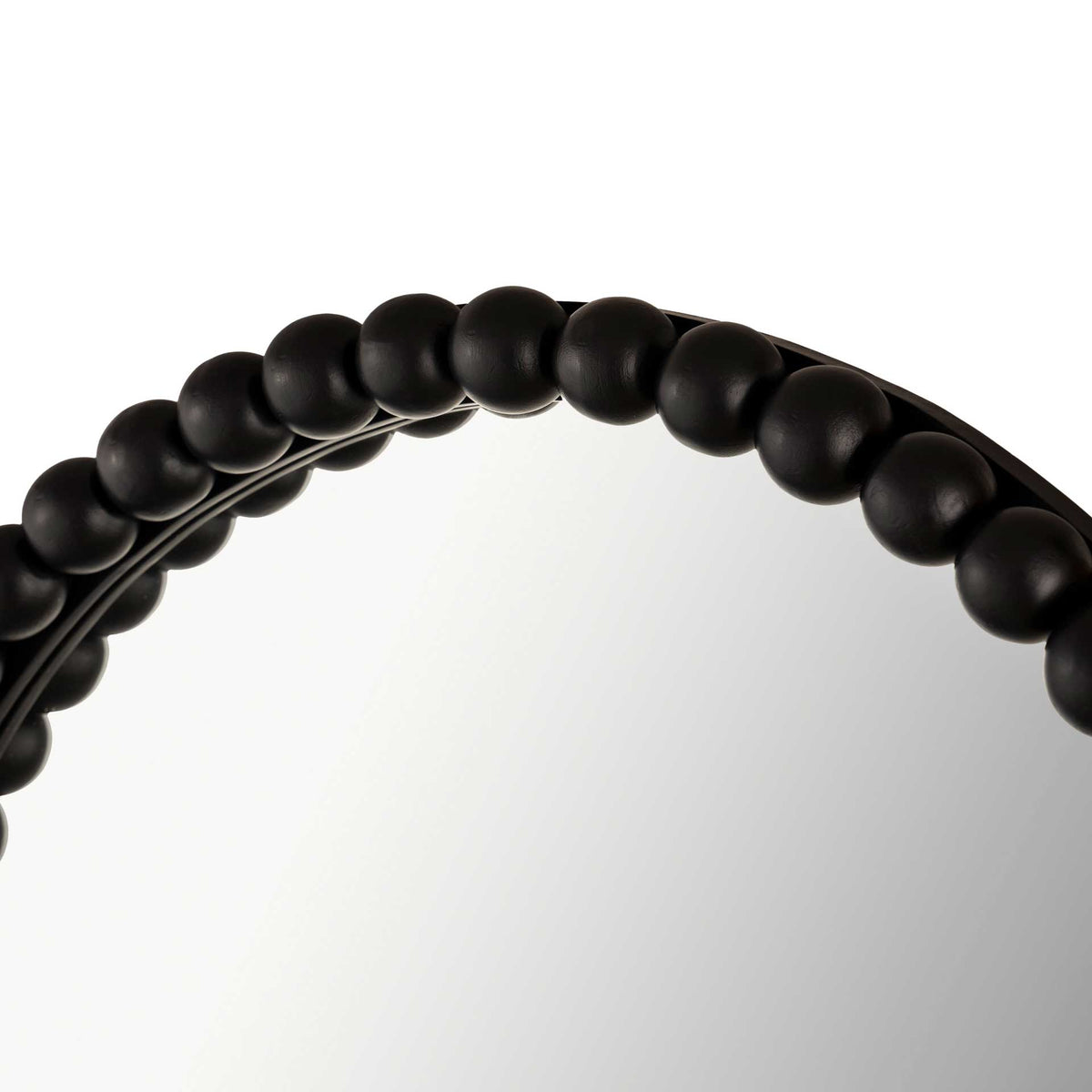 Smooth black wooden beads meet a slim inner rim for a richly textured mirror frame.