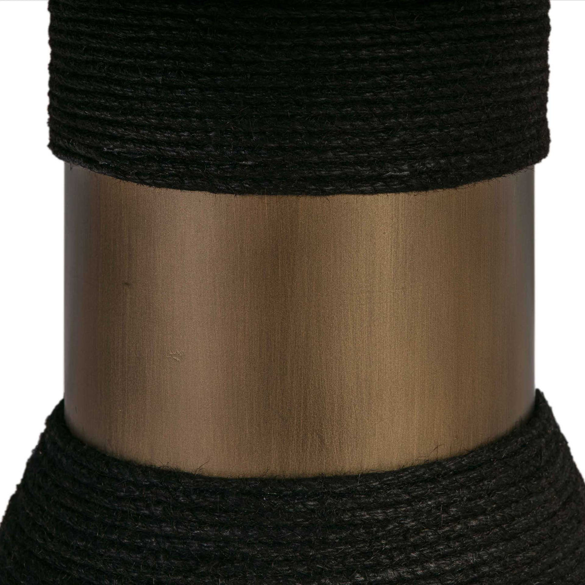 A warm metallic collar adds a polished contrast between bands of tightly wrapped black rope