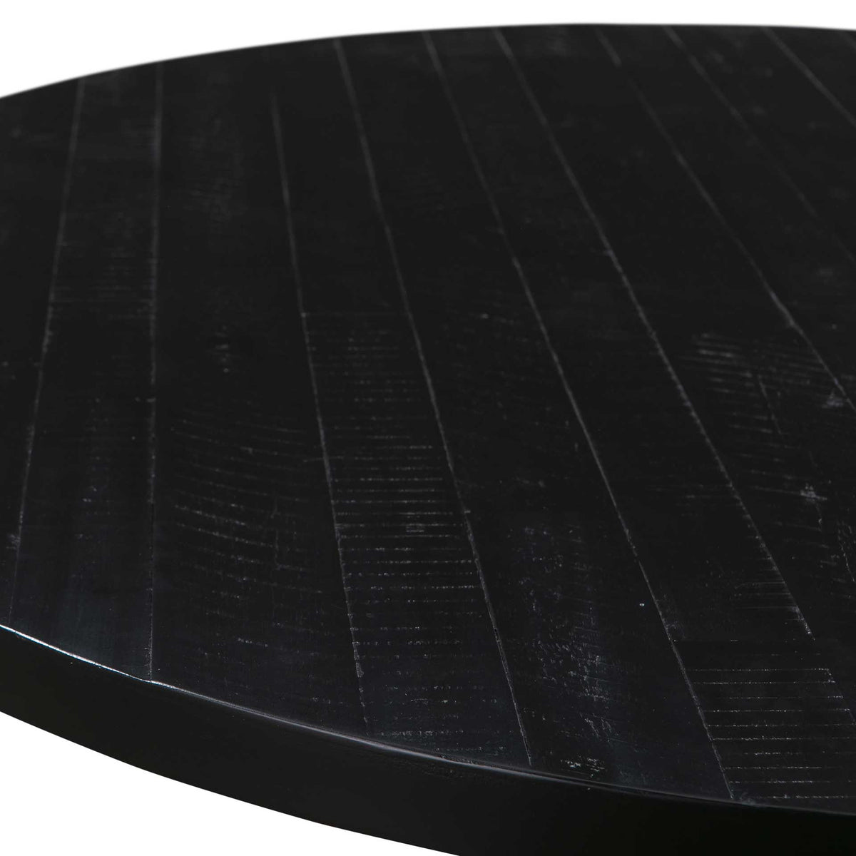 Rich black wood grain and a smooth curved edge give the round tabletop a refined finish