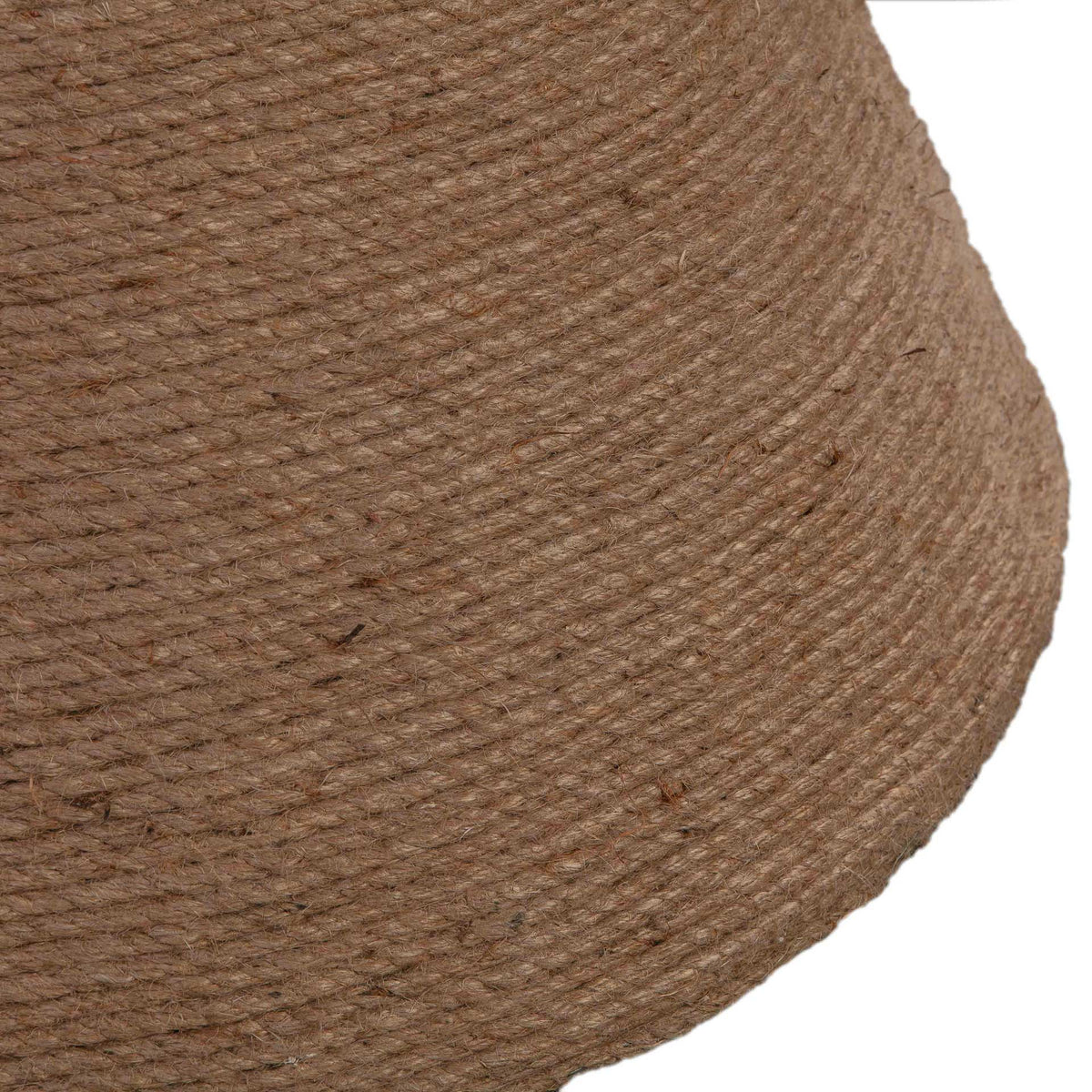Layers of natural rope give the flared pedestal a richly tactile finish