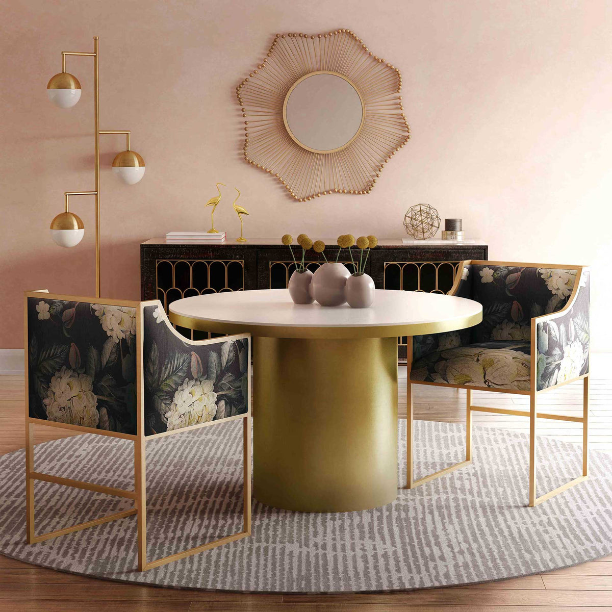 Gold-framed floral velvet chairs bring botanical elegance to a round dining table