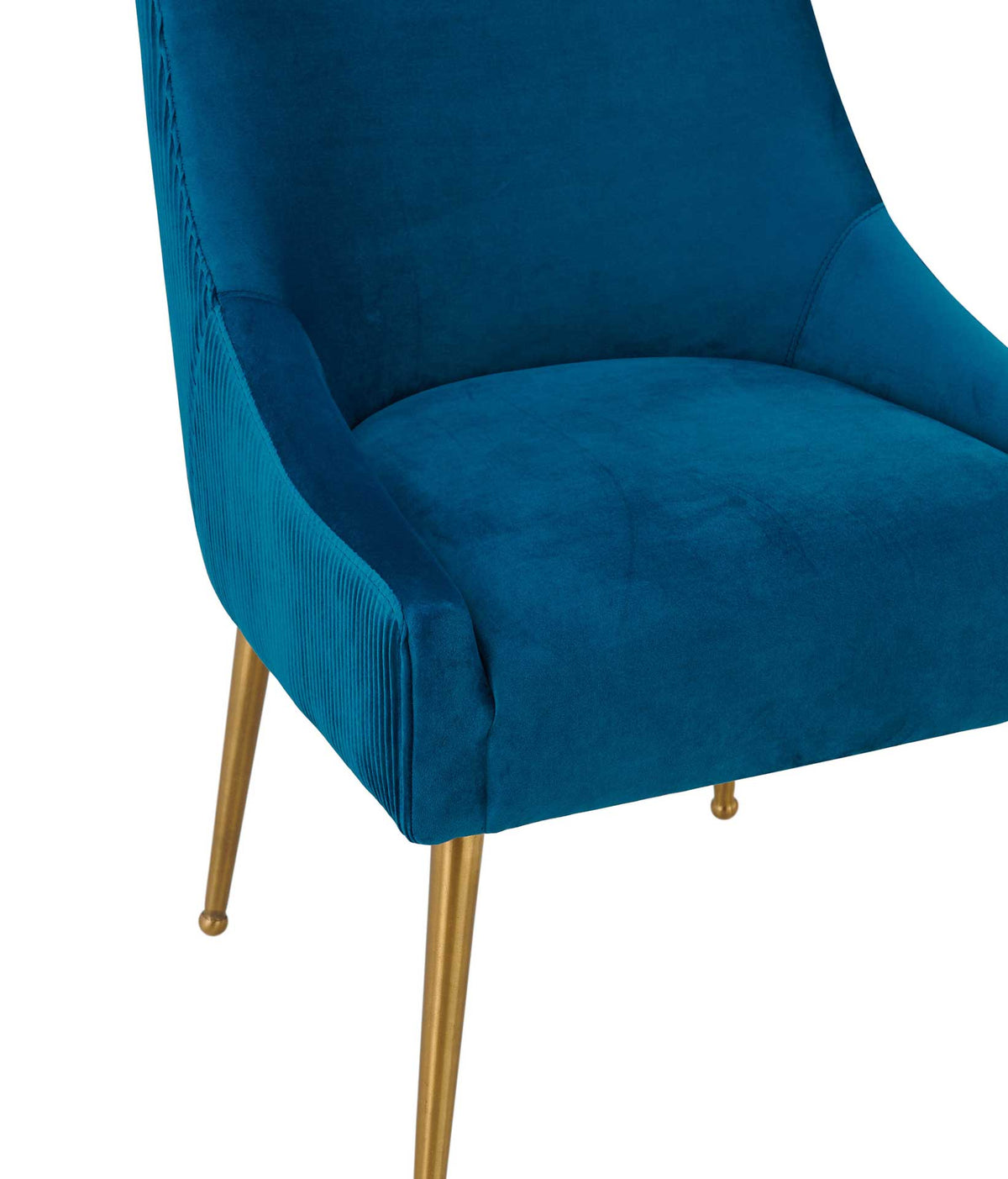 Plush blue velvet upholstery softens the seat, while curved sides add a tailored, enveloping feel.