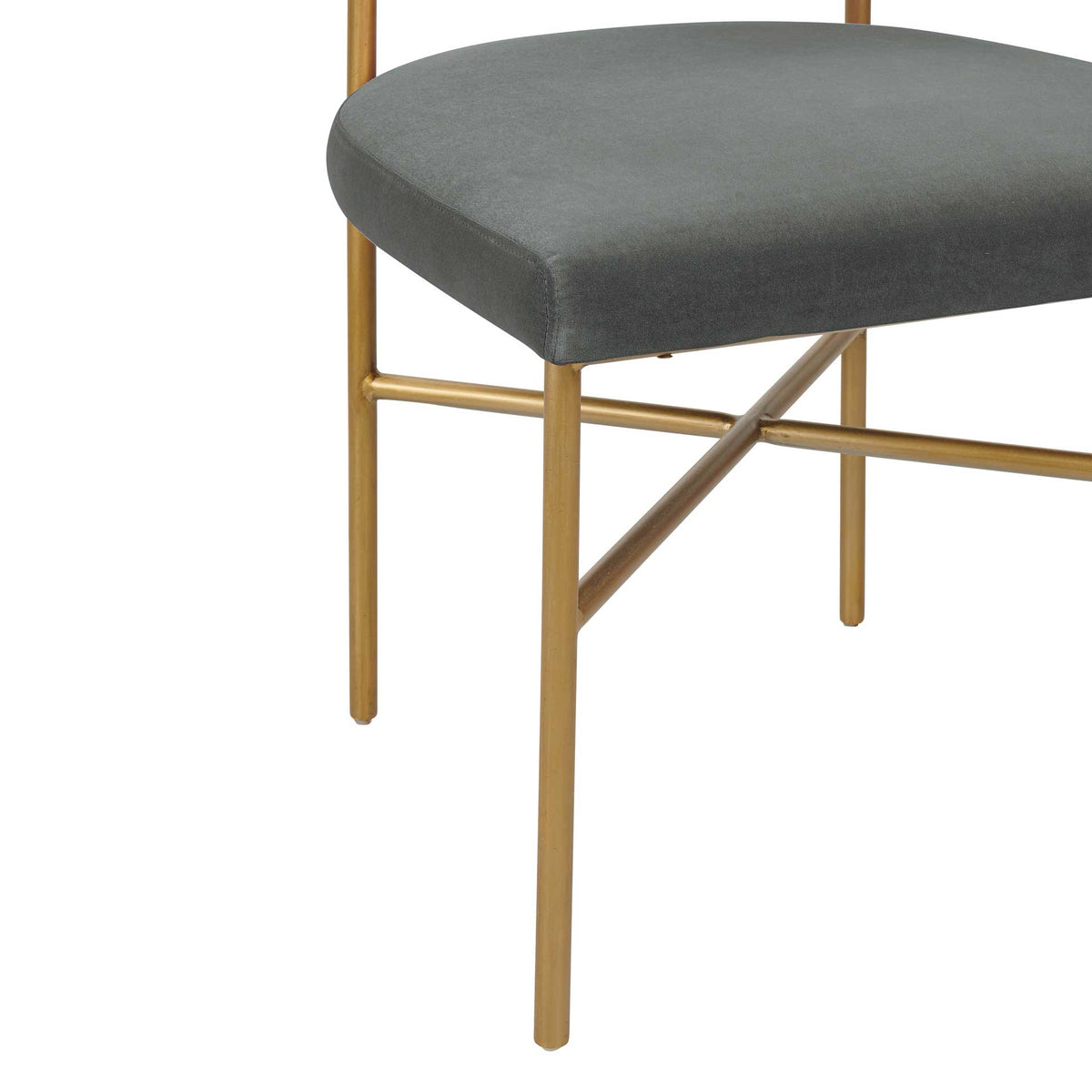 Slender gold legs and diagonal braces provide a striking base for the cushioned gray velvet seat