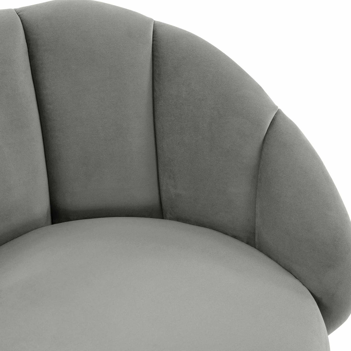 Supple light gray velvet pairs deep vertical channels with softly padded arms and a smooth seat