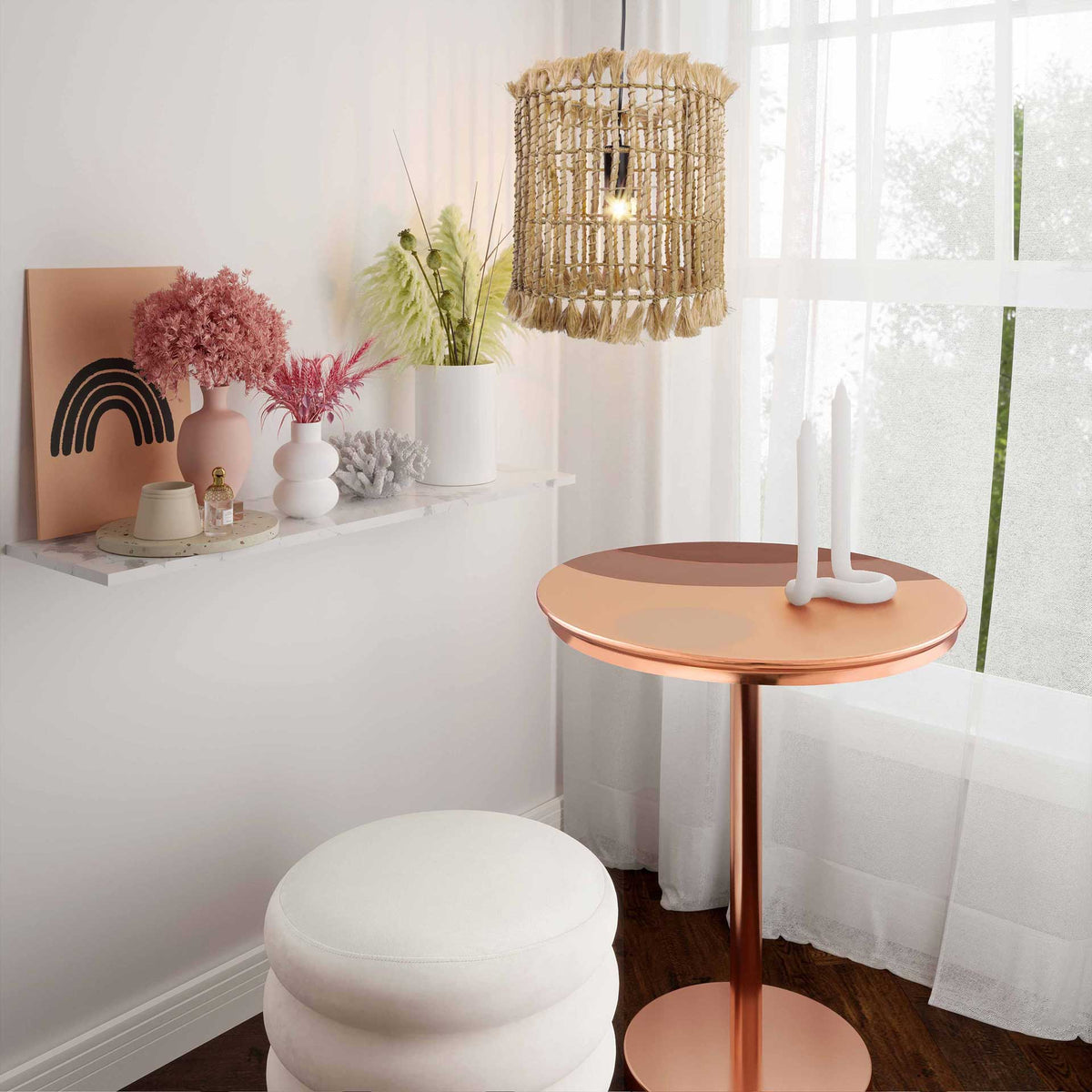 A fringed abaca pendant brings warm texture to a sunny nook with a copper-toned table