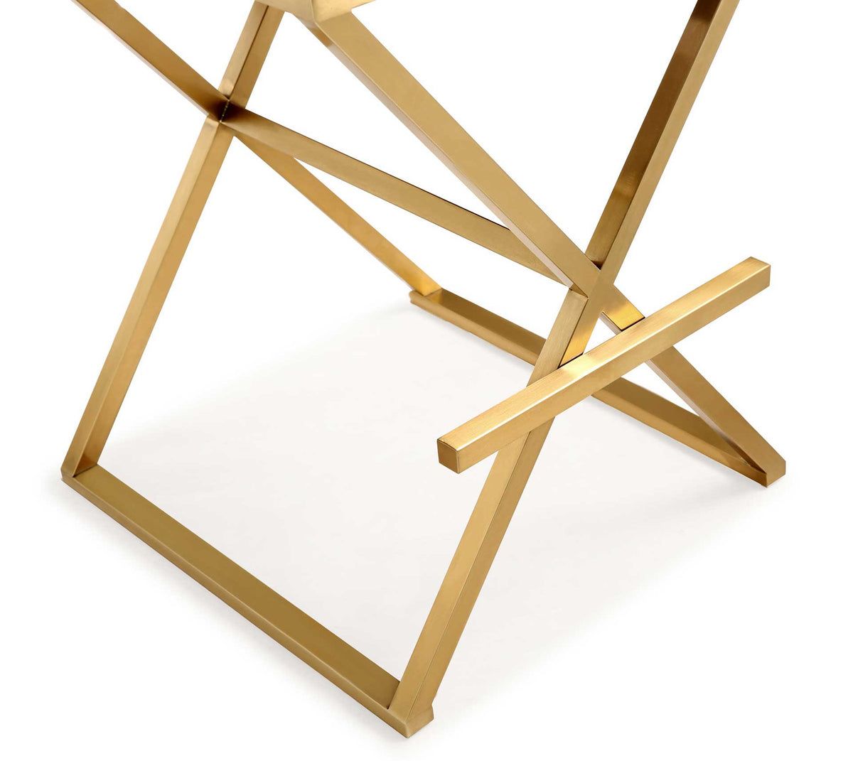 An angular gold stainless steel X-base pairs with a slim footrest for striking support
