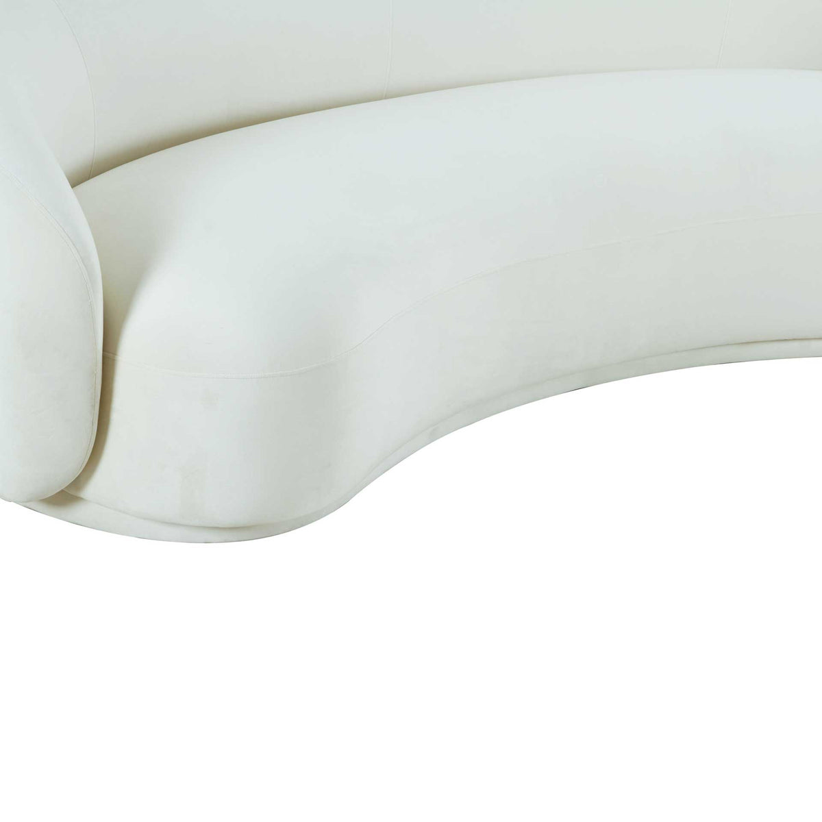Soft cream velvet and a smooth curved seat edge create a refined, tailored finish