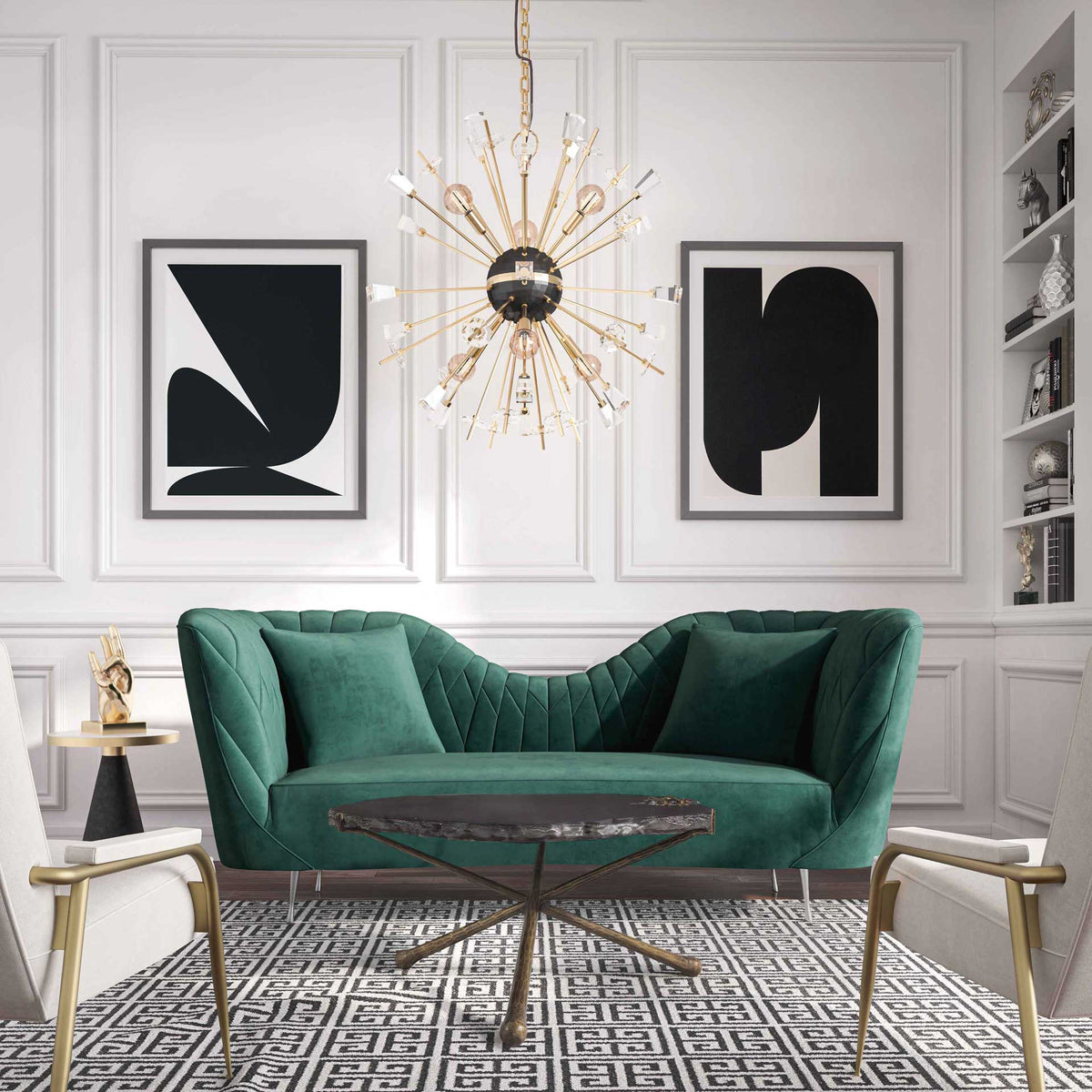 Rich green velvet, sweeping curves, and coordinating pillows create a glamorous living room centerpiece.